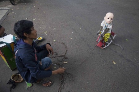 One of the basic tricks is riding a small wooden horse.